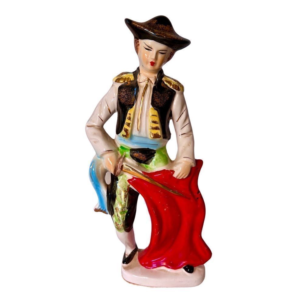 Vibrant Mid Century Bullfighter Figurine
Matador Statue With Sword & Red
Cape